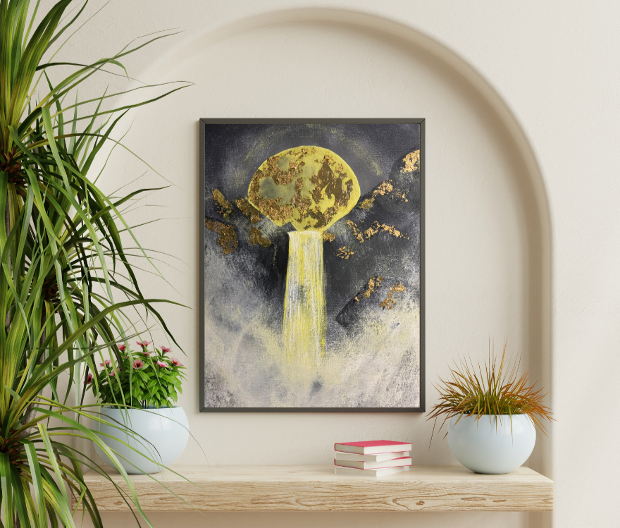 Framed abstract art piece on a wall with plants and books below